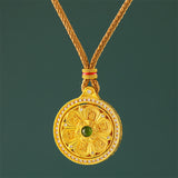 Gold Plated Brass Om Mani Padme Hum Rotating Round Necklace — necklace view 1