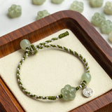 Carved Jade Blossom Braided Bracelet — product view