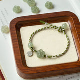 Carved Jade Blossom Braided Bracelet — detail view 3