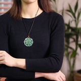 Carved Jade Lotus Disc Necklace — detail view 3