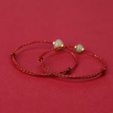 Carved Jade Lotus Red Cord Bracelet — product view 2
