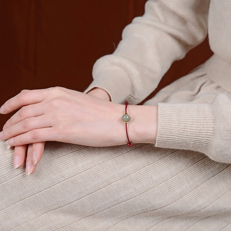 Carved Jade Lotus Red Cord Bracelet — product view 5