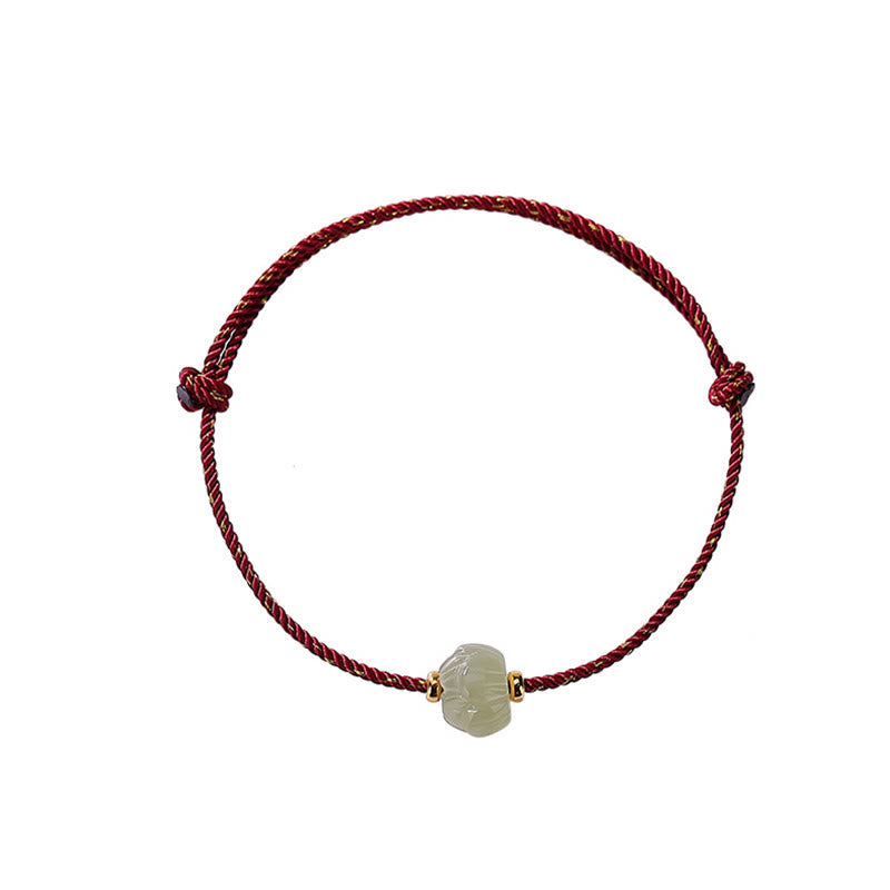 Carved Jade Lotus Red Cord Bracelet — product view 6