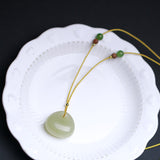 Carved Jade Pouch Cord Necklace — product view 2