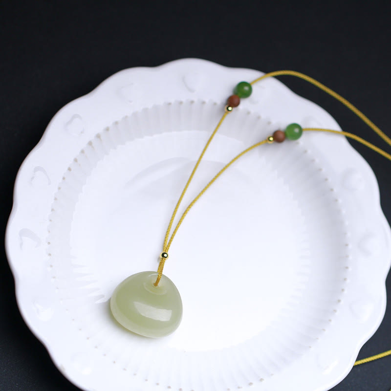 Carved Jade Pouch Cord Necklace — product view 2