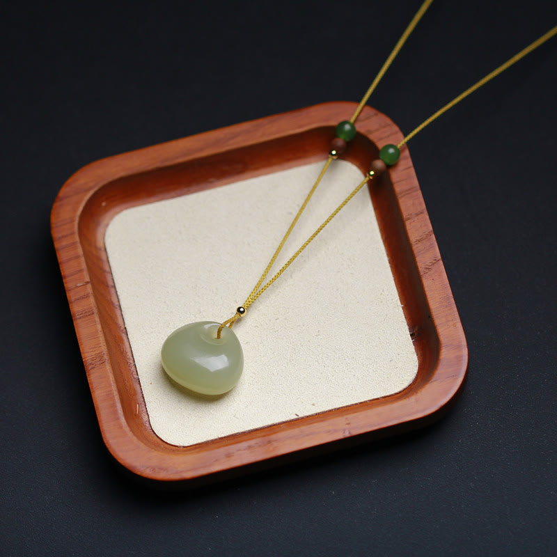 Carved Jade Pouch Cord Necklace — product view 3