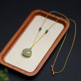 Carved Jade Pouch Cord Necklace — product view 4
