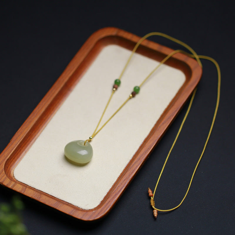 Carved Jade Pouch Cord Necklace — product view 4