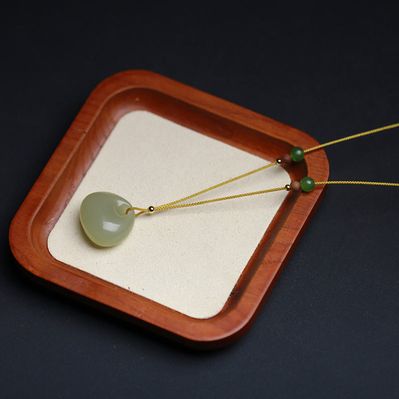 Carved Jade Pouch Cord Necklace — product view 6