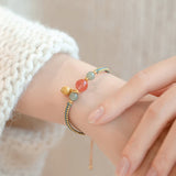 Carved Lotus Stone Cord Bracelet — detail view 6