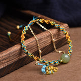 Double Cord Jade Bead Bracelet — detail view 2