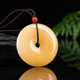 Golden Silk Jade Disc Necklace — detail view 2