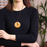 Golden Silk Jade Disc Necklace — detail view 3