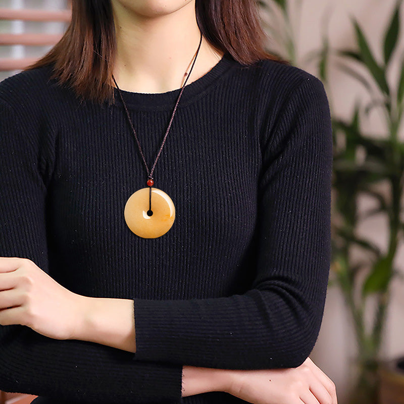 Golden Silk Jade Disc Necklace — detail view 3