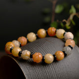 Golden Silk Jade Lotus Bracelet — detail view 2