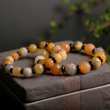 Golden Silk Jade Lotus Bracelet — detail view 4