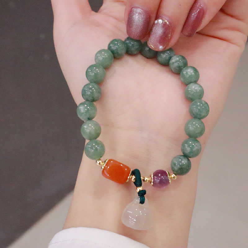 Jade and Amethyst Carved Bead Bracelet — product view