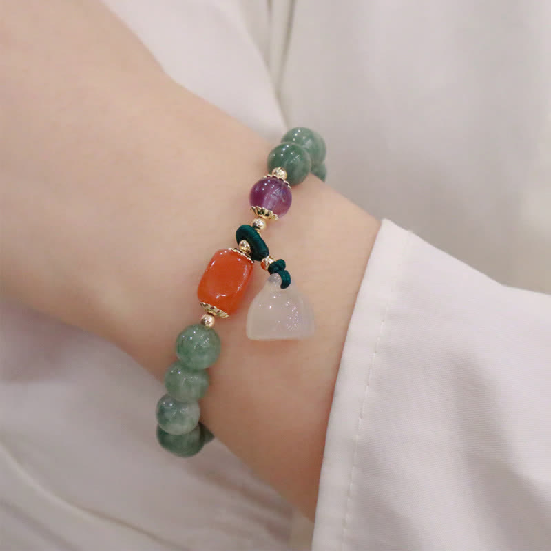 Jade and Amethyst Carved Bead Bracelet — detail view 3
