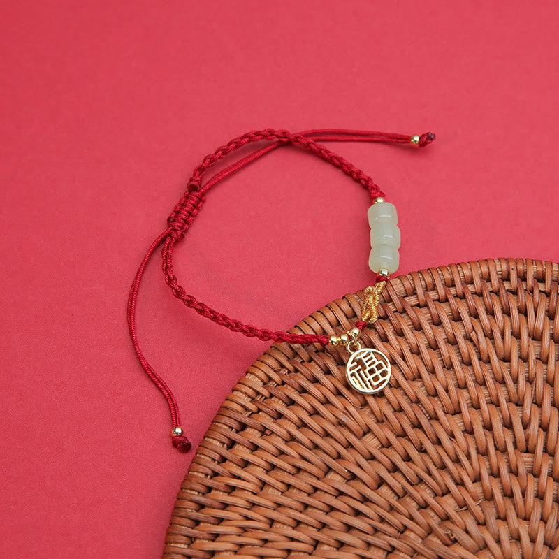 Jade Bead Fu Charm Red Cord Bracelet — product view 1