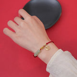 Jade Bead Fu Charm Red Cord Bracelet — product view 4