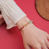 Jade Bead Fu Charm Red Cord Bracelet — product view 5
