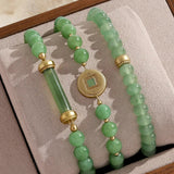 Pulsera de jade con moneda