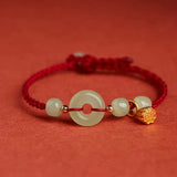 Jade Disc and Lotus Cord Bracelet — product view