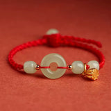 Jade Disc and Lotus Cord Bracelet — detail view 4