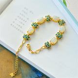 Jade Lotus Chain Bracelet — detail view 2
