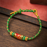 Pulsera trenzada con motivo koi
