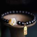 Obsidian and Bodhi Paw Charm Bracelet — product view 1