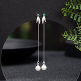 Pearl and Silver Leaf Threader Earrings — product view 1