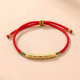 Pulsera roja con cuentas chapadas