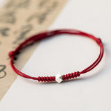 Silver Bead Braided Cord Bracelet — detail view 2