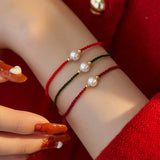 Single Pearl Braided Cord Bracelet — detail view 2