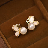Small Pearl Butterfly Stud Earrings — product view 6
