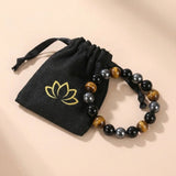 Pulsera de ojo de tigre, obsidiana y hematita
