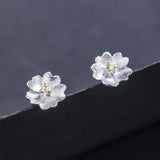 Tiny Silver Blossom Stud Earrings — product view 2
