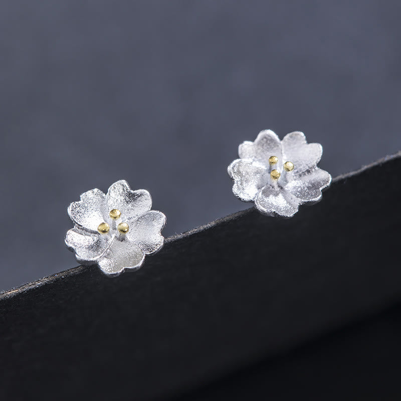 Tiny Silver Blossom Stud Earrings — product view 2