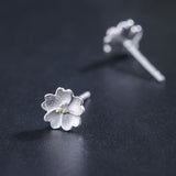Tiny Silver Blossom Stud Earrings — product view 3