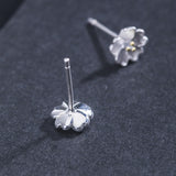 Tiny Silver Blossom Stud Earrings — product view 4