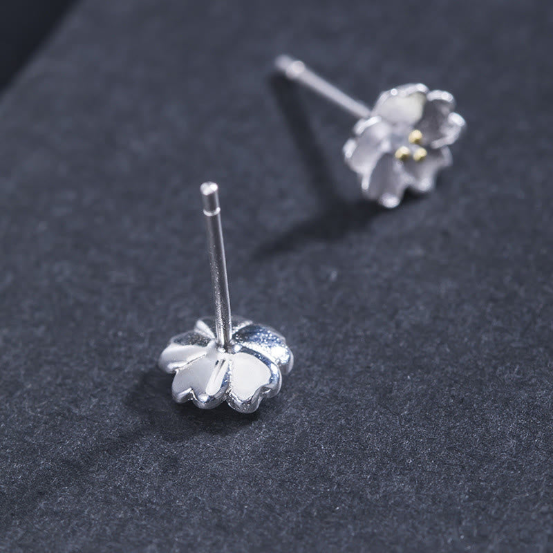 Tiny Silver Blossom Stud Earrings — product view 4