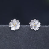Tiny Silver Blossom Stud Earrings — product view 5