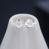 Tiny Silver Blossom Stud Earrings — product view 6