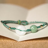 White Jade Disc Braided Bracelet — detail view 3
